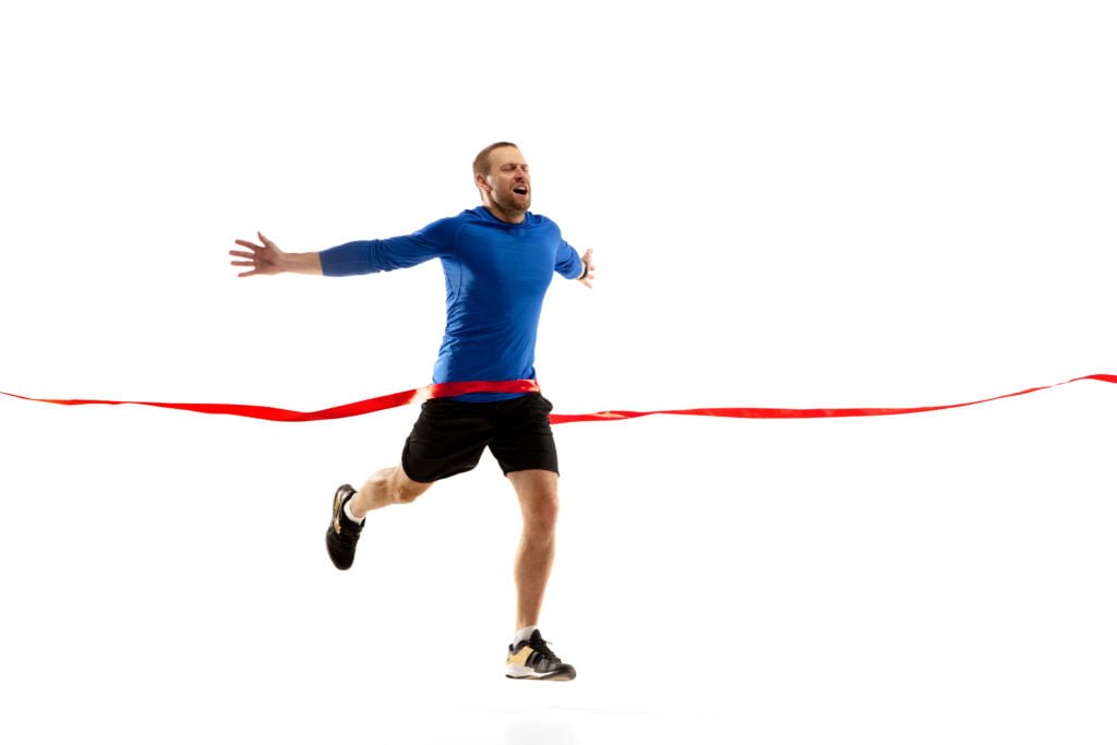high caucasian professional jogger runner training isolated white wall muscular sportive man emotional concept action motion youth healthy lifestyle copyspace ad