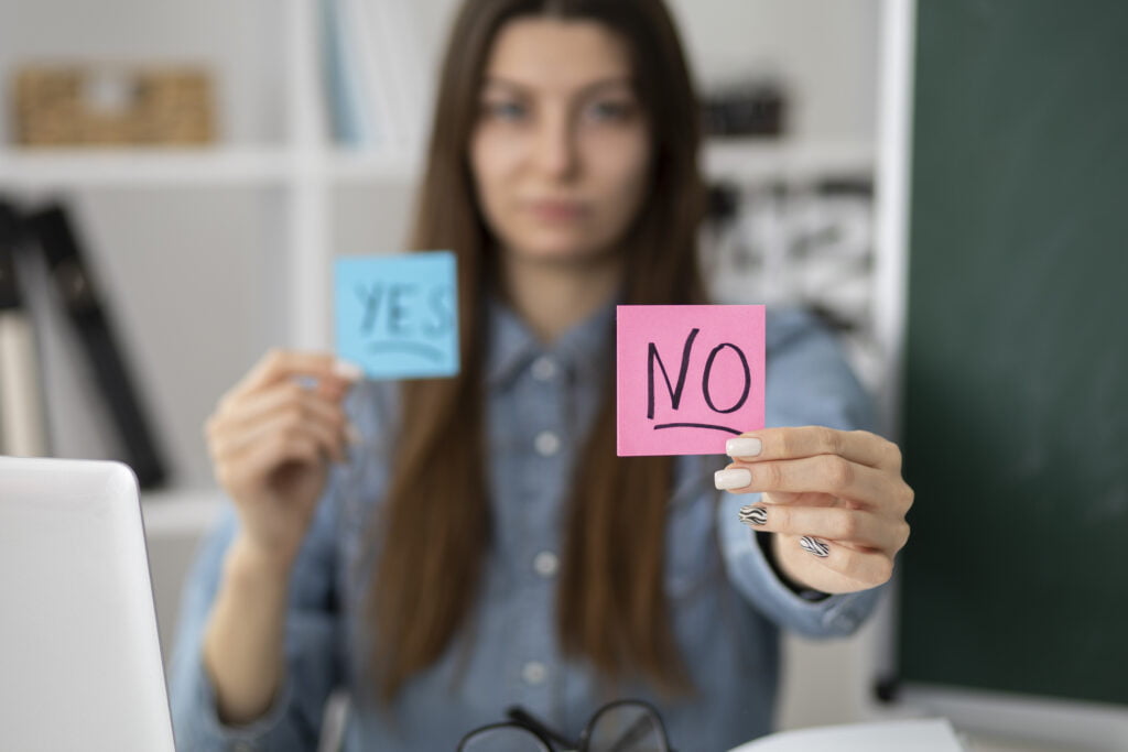 medium shot blurry woman holding post its